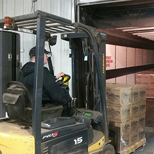 Culligan of Flint loading water onto a truck for relief efforts